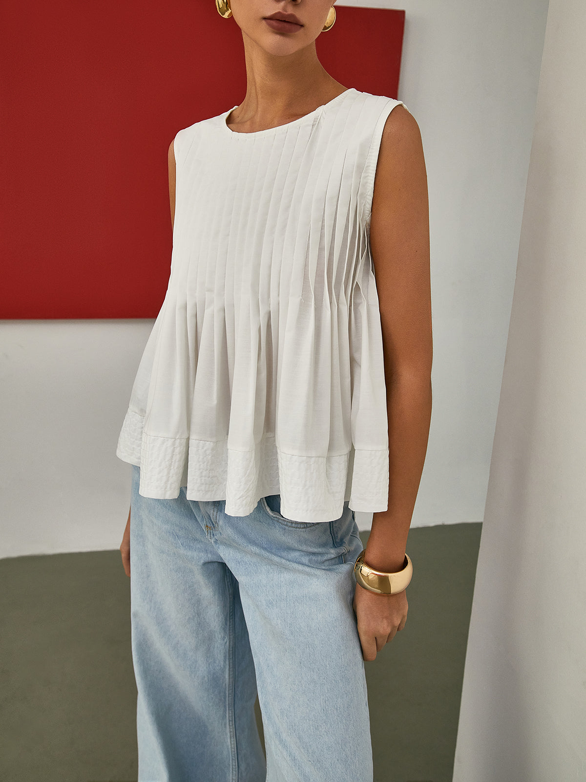 Stella - Pleated Peplum Sleeveless Blouse