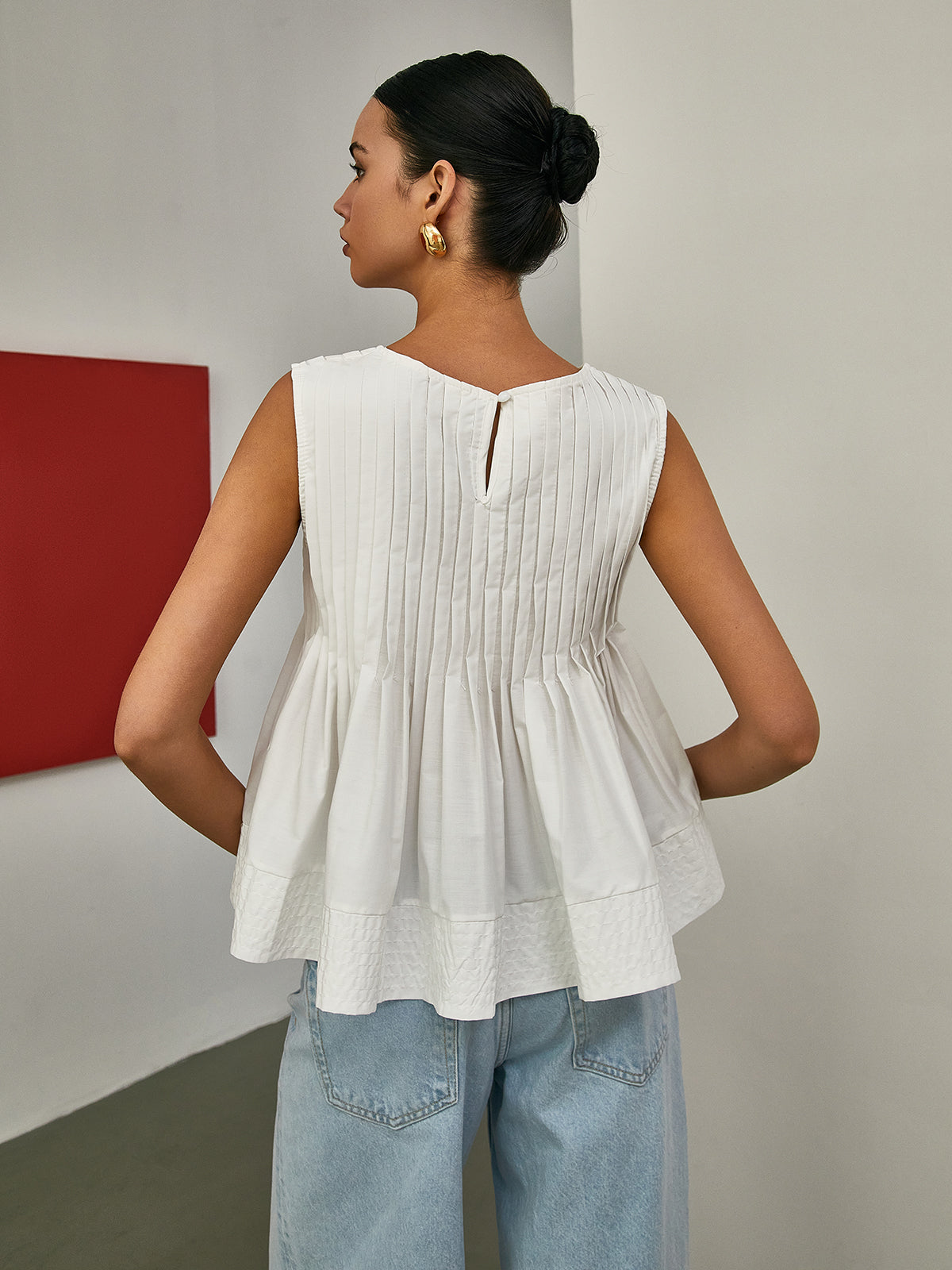 Stella - Pleated Peplum Sleeveless Blouse