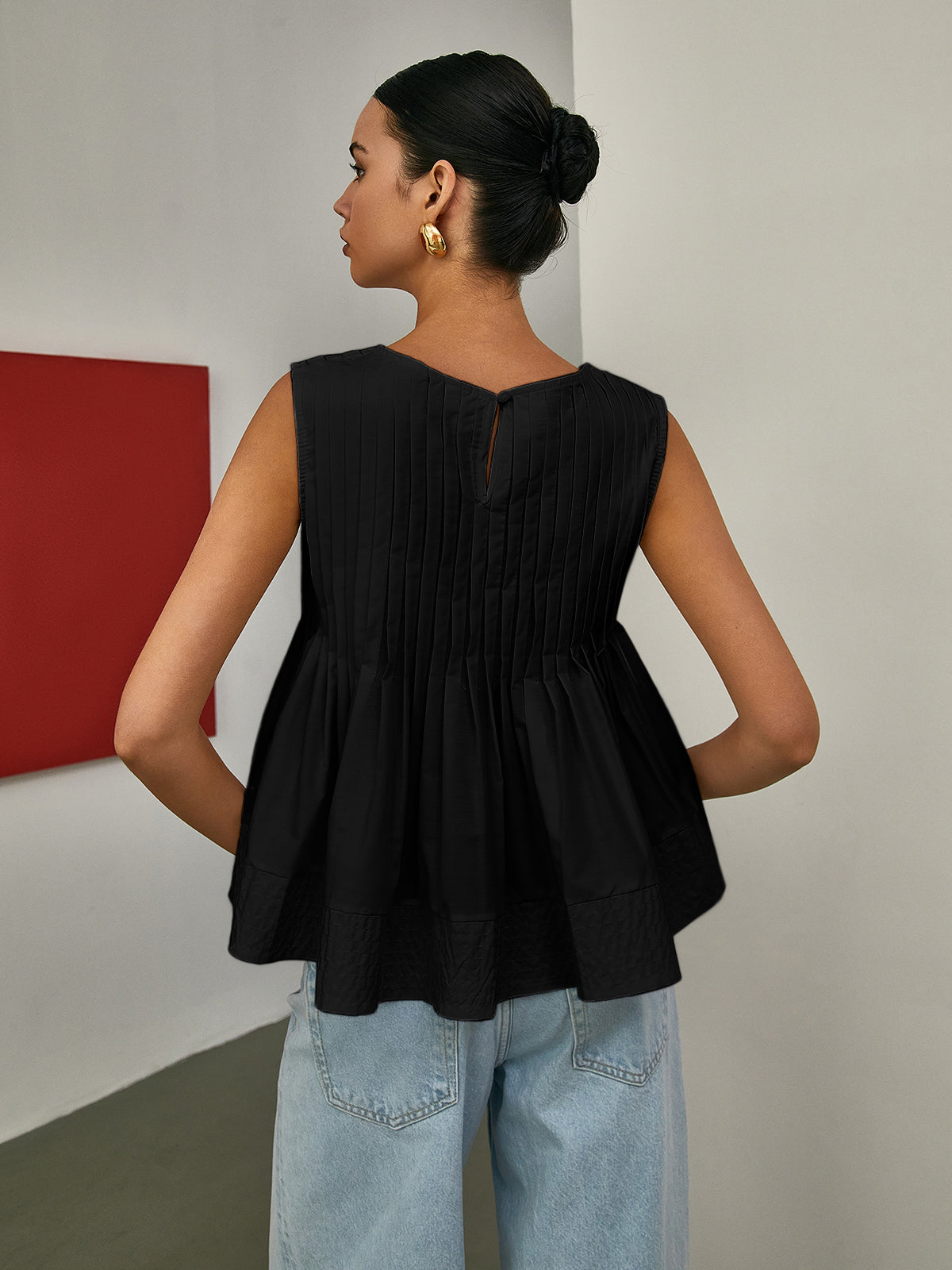 Stella - Pleated Peplum Sleeveless Blouse